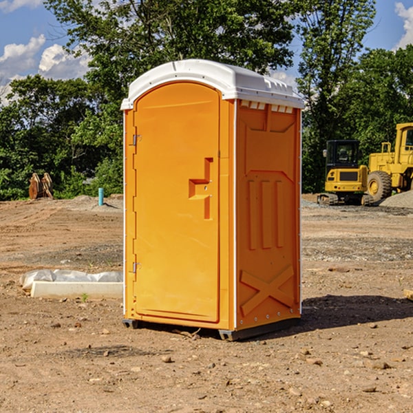 how often are the portable restrooms cleaned and serviced during a rental period in Minburn Iowa